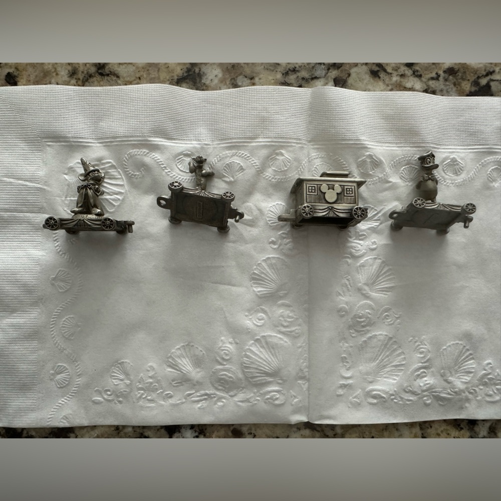 Disney pewter train pieces